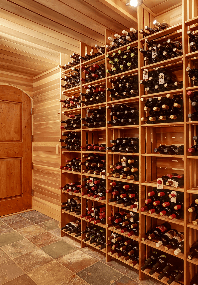 Rustic floor-to-ceiling wooden wine cellar