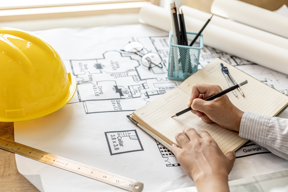home addition contractor working on a design for client